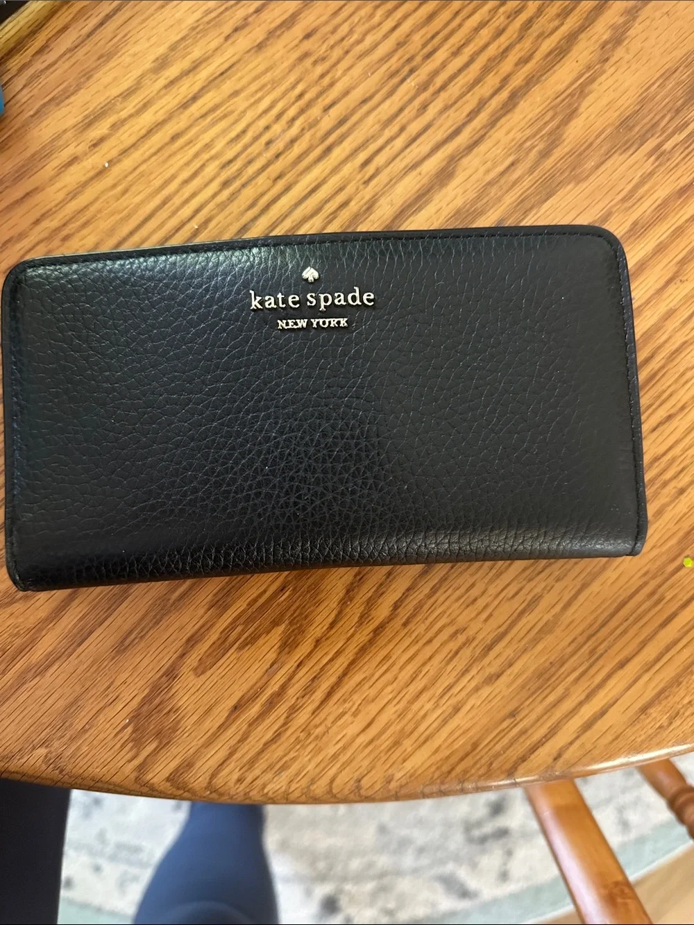 kate spade black pebbled leather zip wallet with gold logo